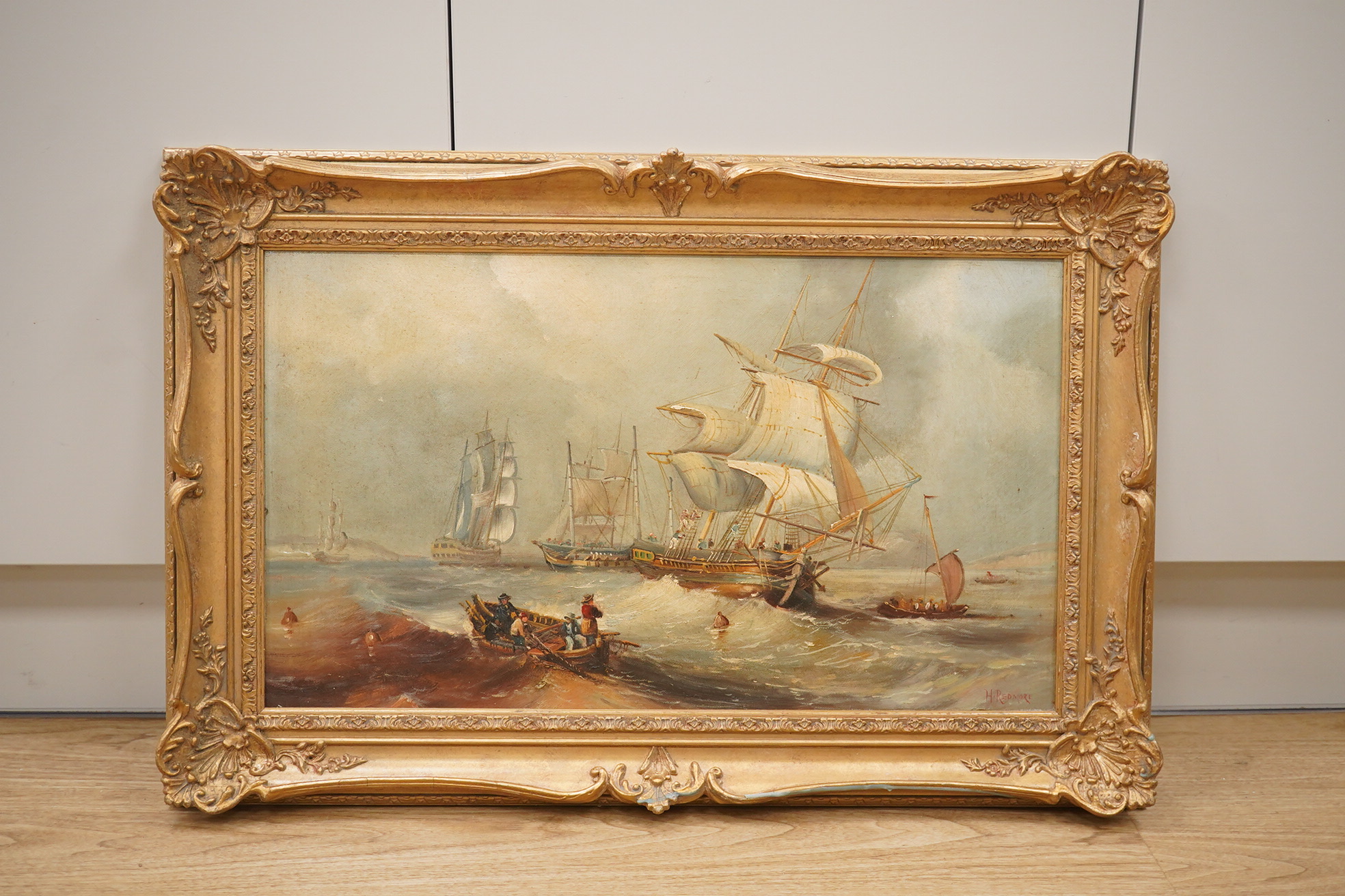 Manner of Henry Redmore, oil on canvas board, Maritime scene with ships, 34 x 58cm, ornate gilt framed. Condition - poor